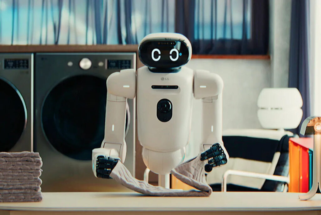 A domestic service robot demonstrating household chores during a technology showcase.